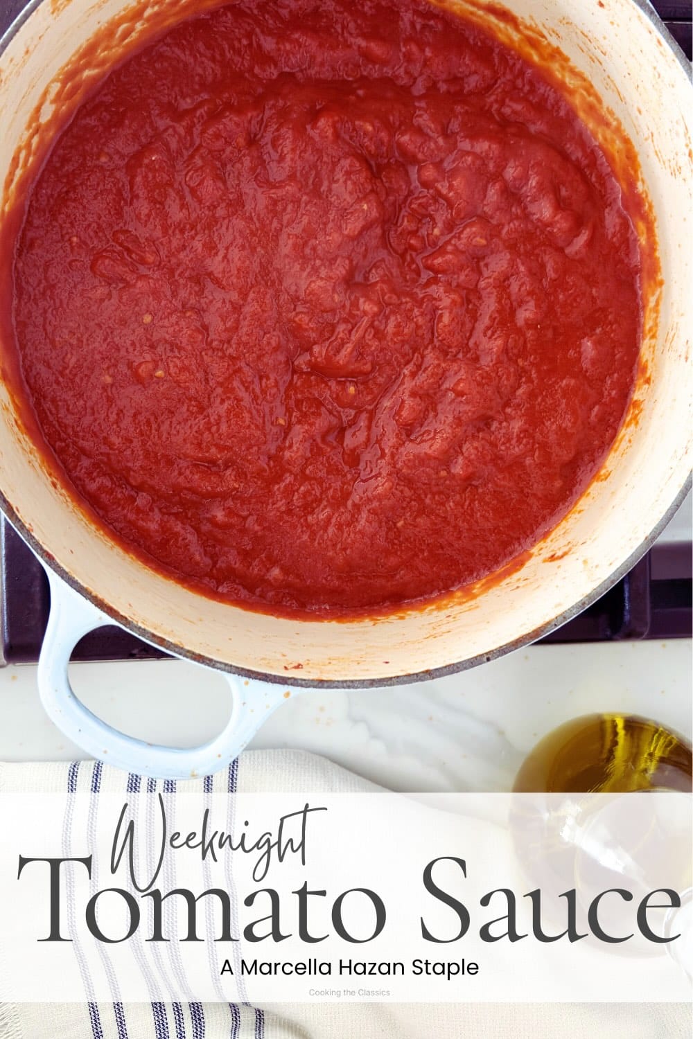 Marcella Hazan's Three Ingredient Tomato Sauce Marcella Hazan tomato sauce simmering in saucepan