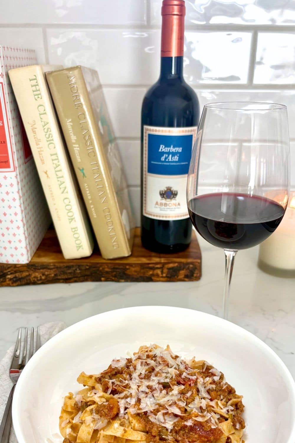 pasta with Marcella Hazan bolognese sauce and a glass of Barber red wine