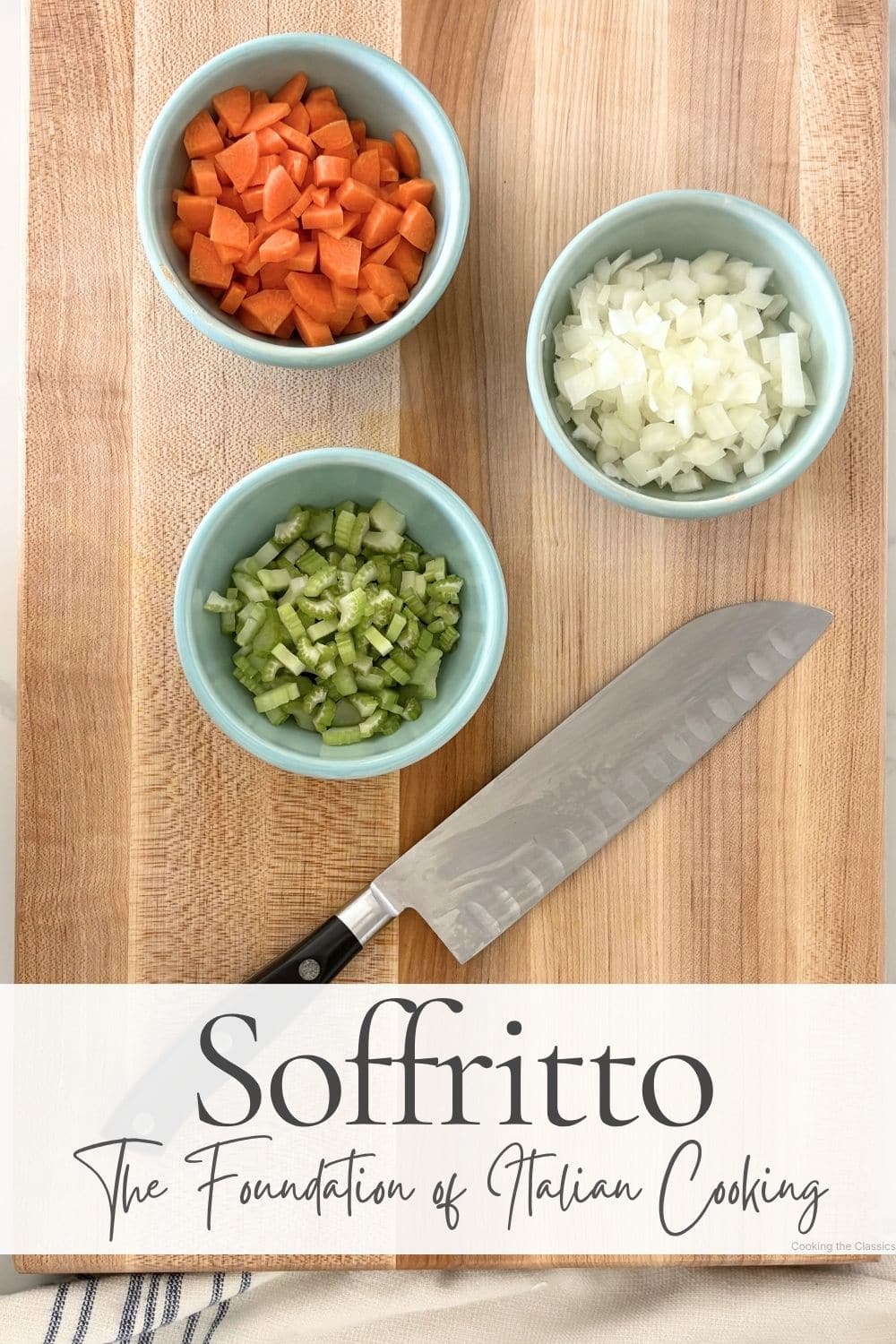 Chopped onion, carrot, and celery in bowls on a cutting board for soffritto
