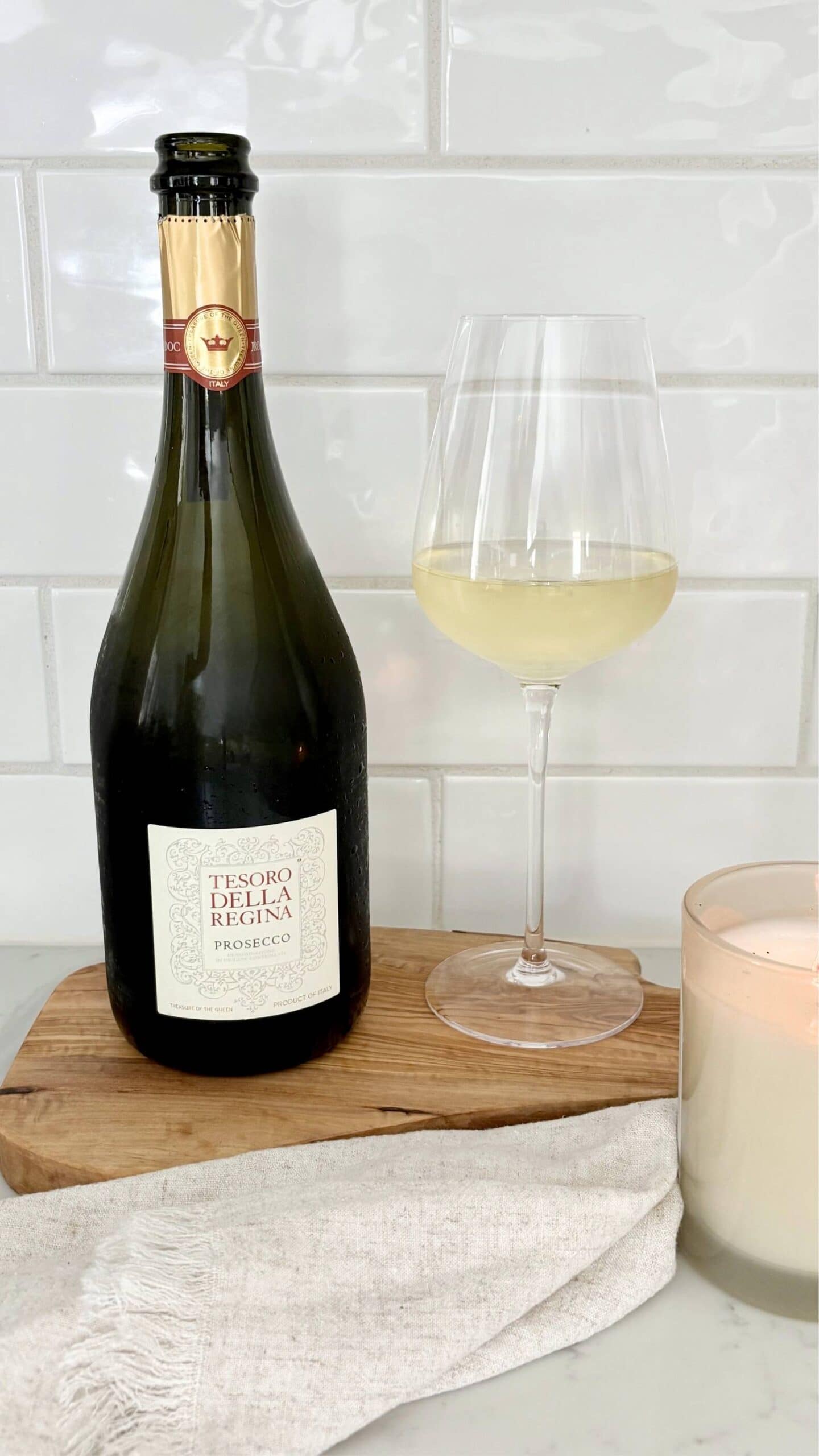 Glass of Prosecco being poured, Italian sparkling wine for appetizer and bruschetta pairing.