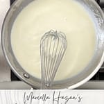 Béchamel sauce in a saucepan used for lasagna and baked pasta dishes.