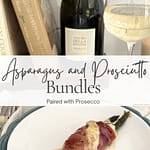 Asparagus and prosciutto bundles served with melted cheese on a plate, styled with prosecco and cookbooks