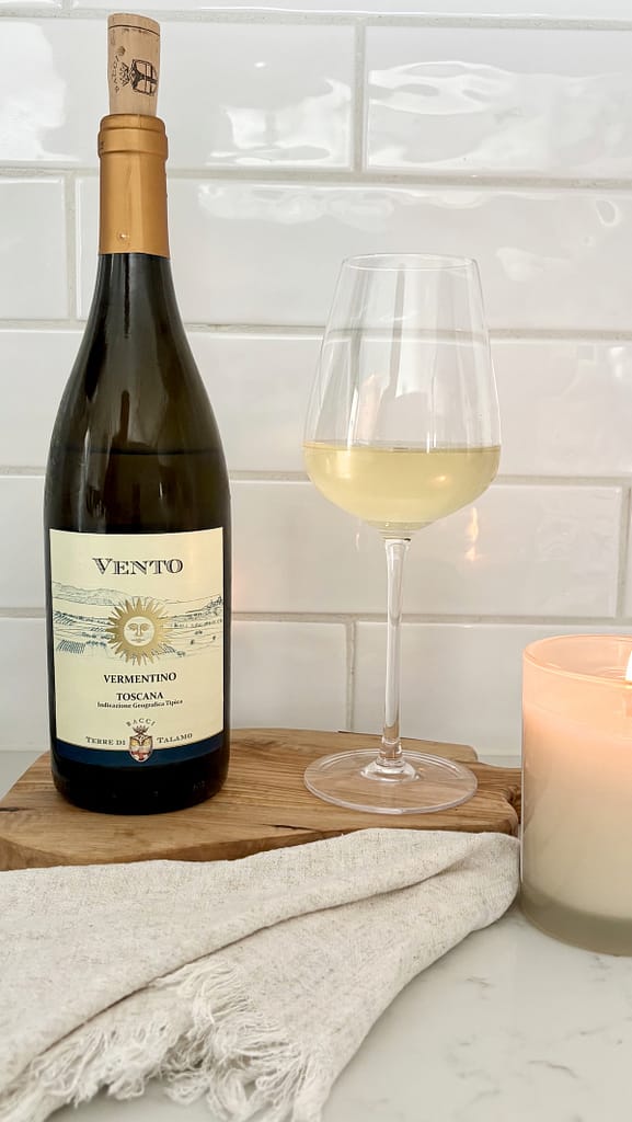 Vermentino wine bottle and glass for Italian food pairing