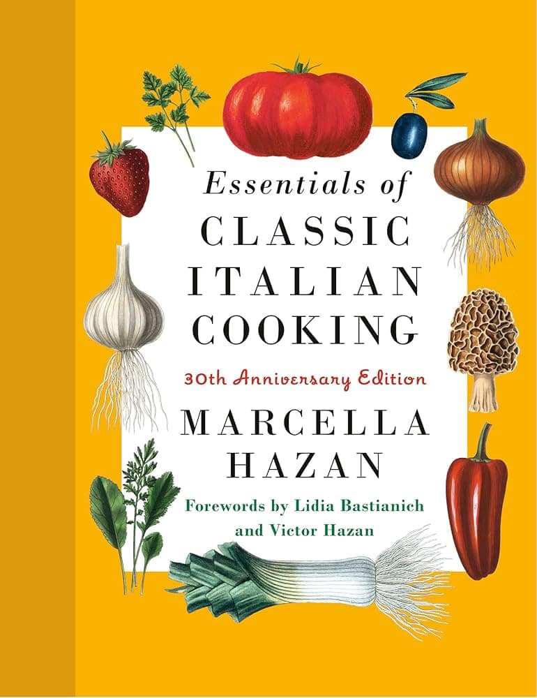 Marcella Hazan Essentials of Classic Italian Cooking cookbook cover with illustrated vegetables on a yellow background